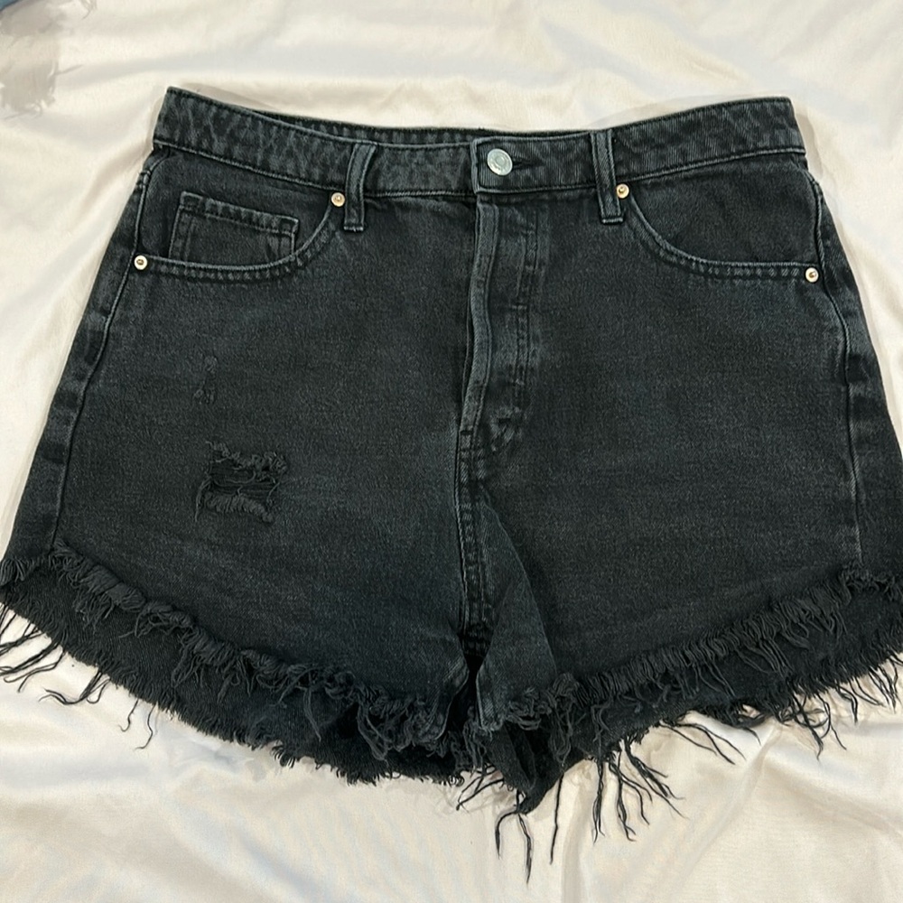 Black fringe denim shorts
